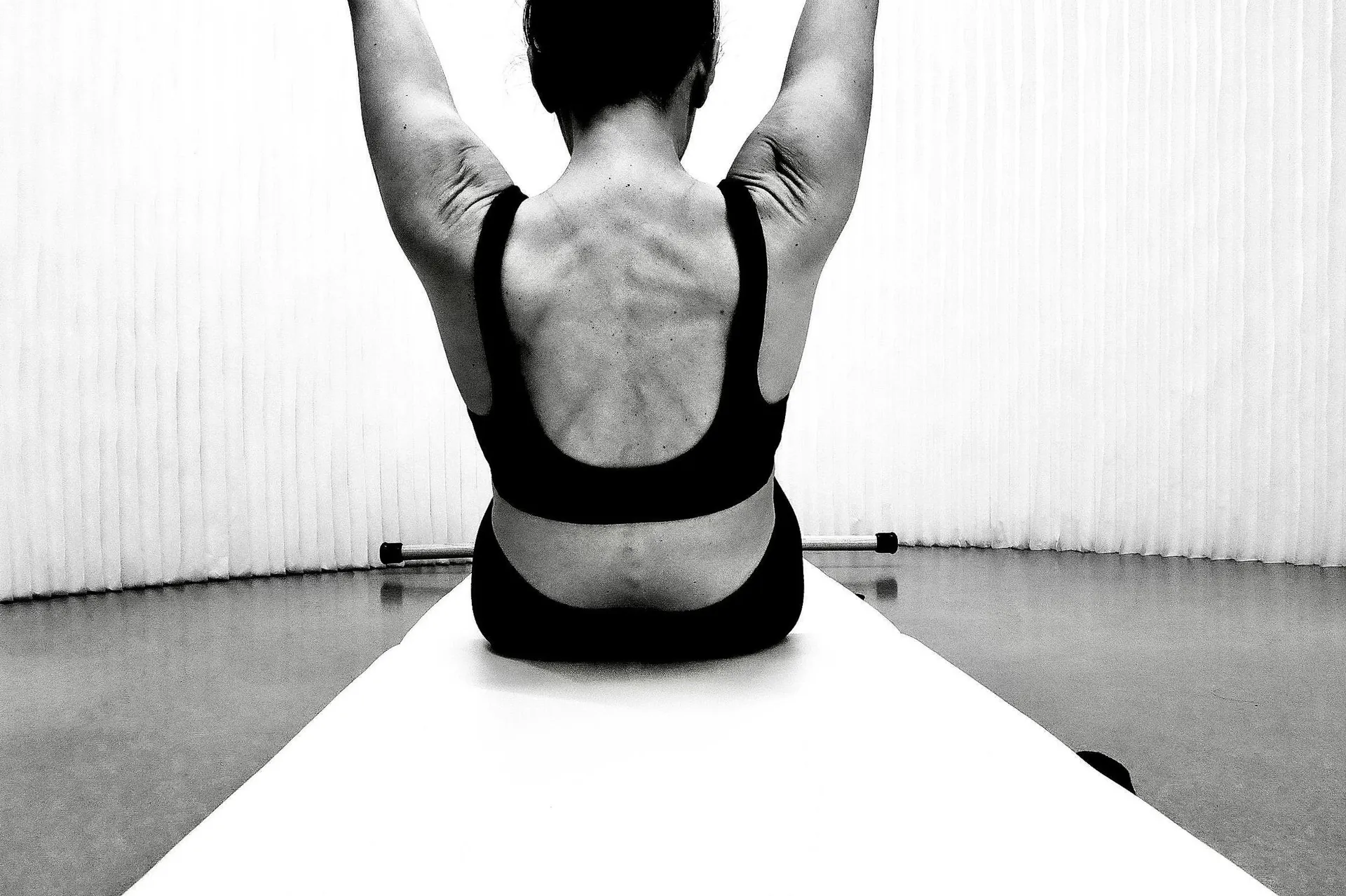Personalized Pilates movement session in a bright studio